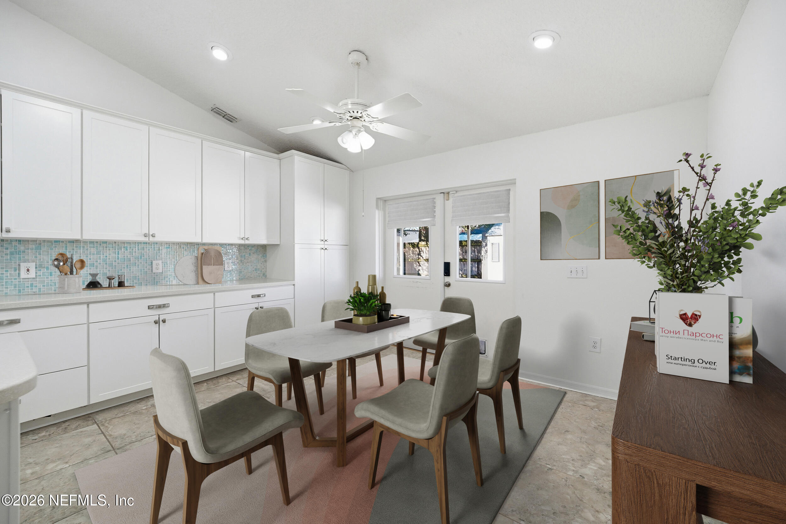 3380 Net Court Jacksonville, FL 32277 - Photo 8 of 20 a view of a dining room with furniture and chandelier