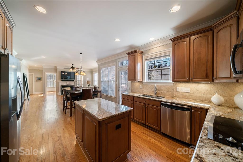 268 Hemmingway Lane Fort Mill, SC 29708 - Photo 15 of 43 a kitchen with stainless steel appliances granite countertop a sink a stove and a refrigerator