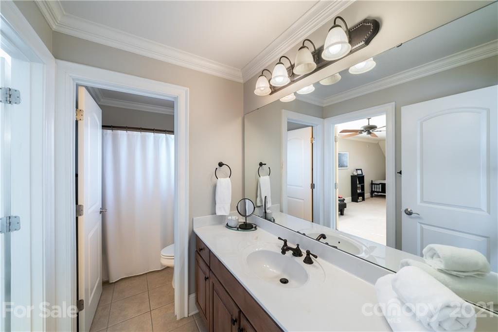 268 Hemmingway Lane Fort Mill, SC 29708 - Photo 35 of 43 a bathroom with a sink and a mirror