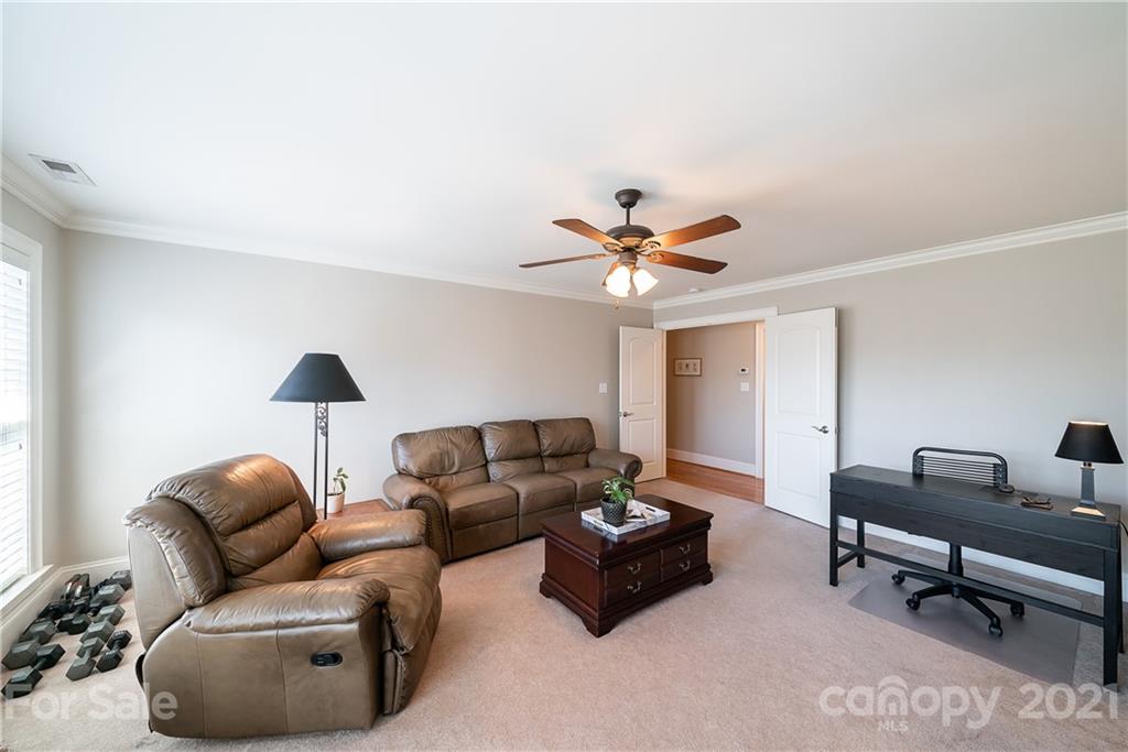268 Hemmingway Lane Fort Mill, SC 29708 - Photo 36 of 43 a living room with furniture and a ceiling fan