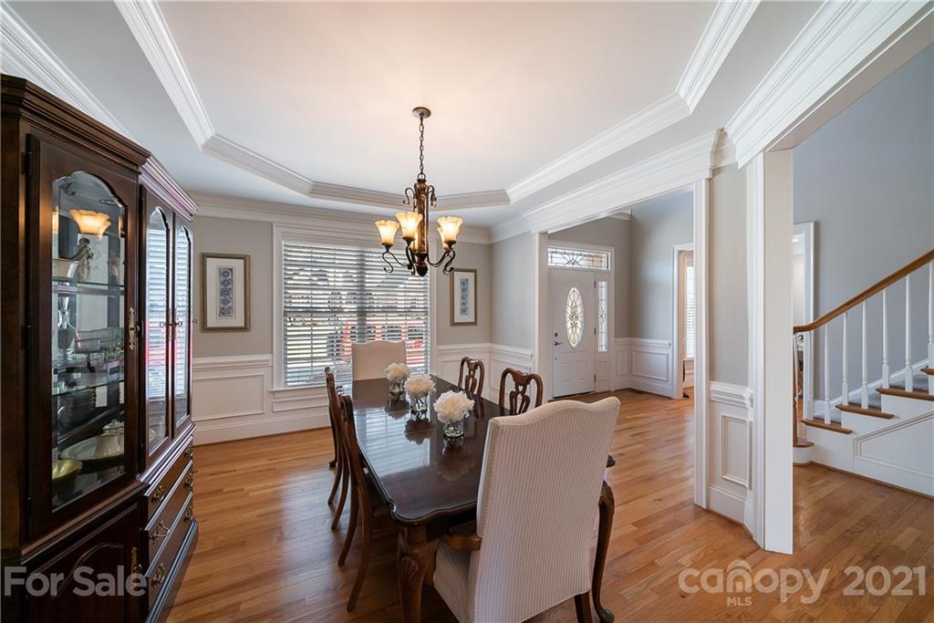 268 Hemmingway Lane Fort Mill, SC 29708 - Photo 9 of 43 a view of a dining room with furniture window and wooden floor