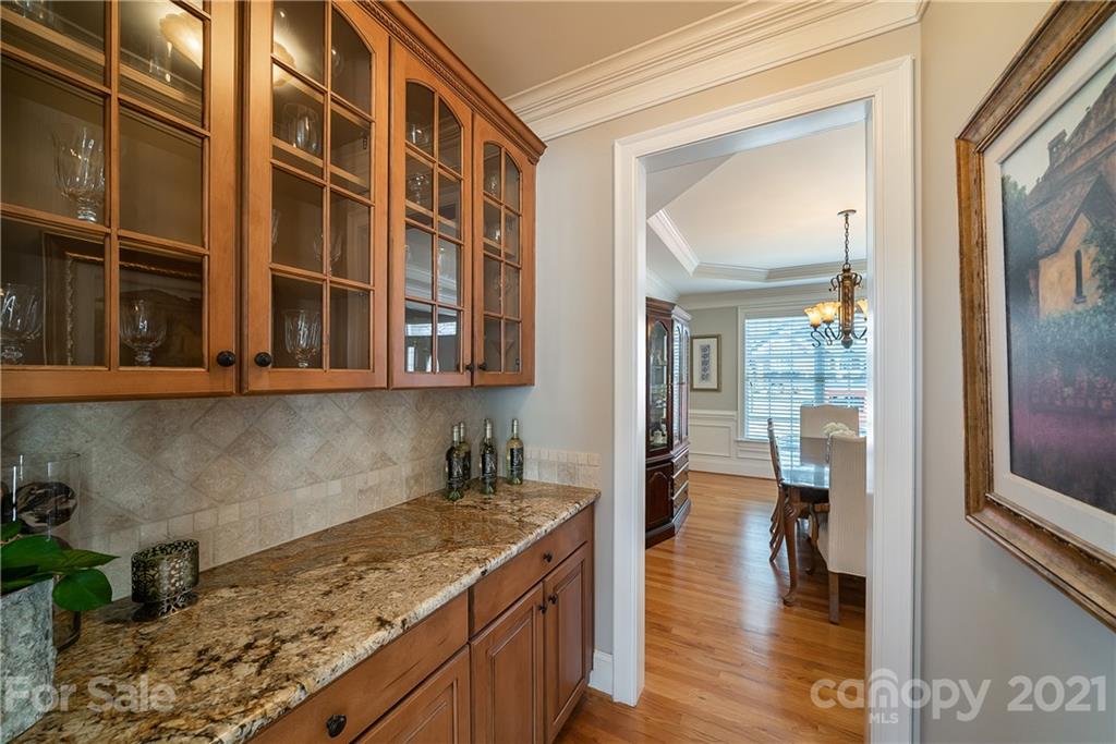 268 Hemmingway Lane Fort Mill, SC 29708 - Photo 10 of 43 a view of a kitchen cabinets and a wooden floor