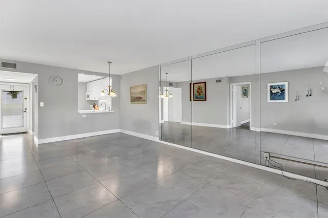 a view of livingroom with hardwood floor and a window