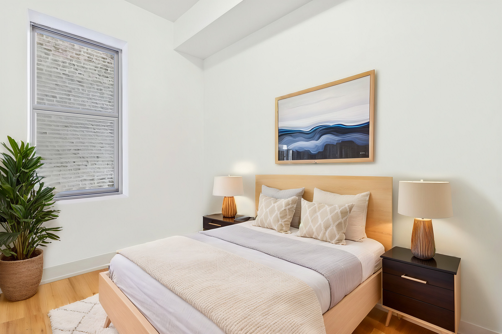 1908 West 48th Street Chicago, IL 60609 - Photo 8 of 36 a bedroom with a bed and a potted plant