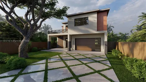 a front view of a house with a garden and plants