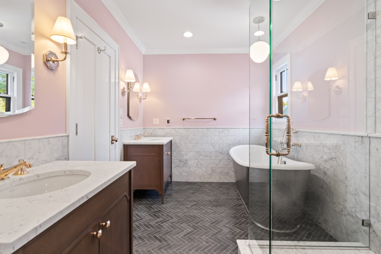 1045 Pine Street Winnetka, IL 60093 - Photo 22 of 38 a bathroom with a sink double vanity and a mirror