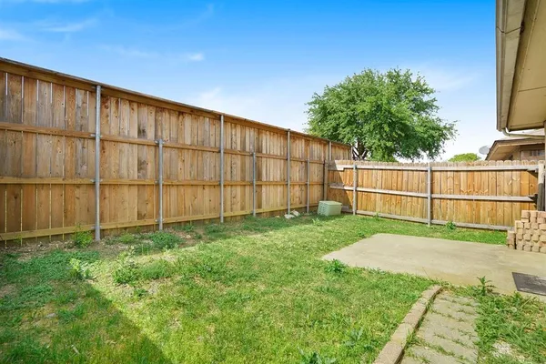 a view of backyard with green space