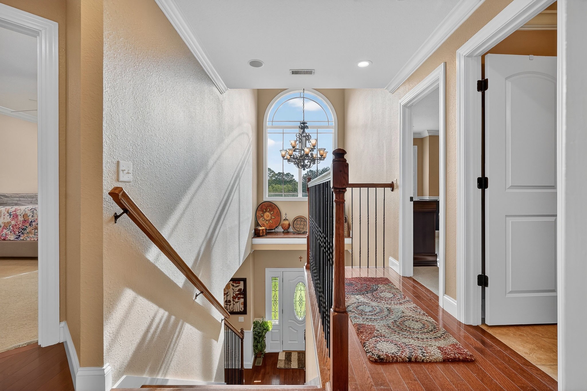 933 John Henry Lewis Road Dunlap, TN 37327 - Photo 37 of 100 a view of a hallway with wooden floor and staircase