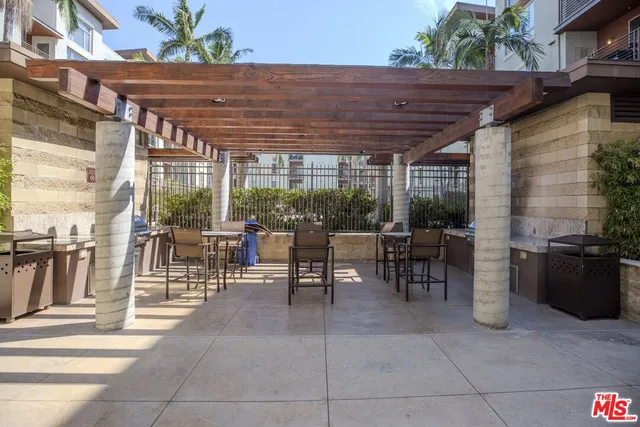 a table and chairs in a patio