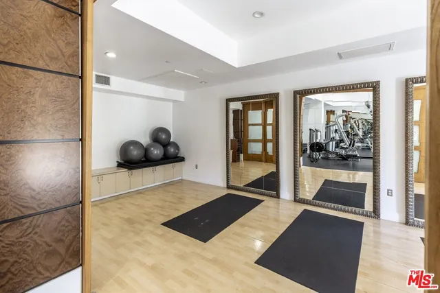a bathroom with a tub and shower