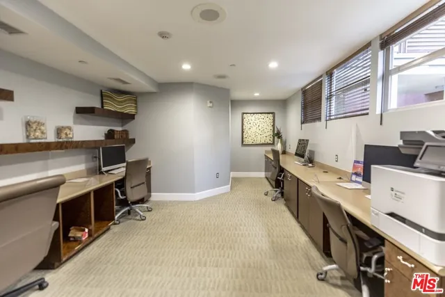 a living room with furniture window and a flat screen tv