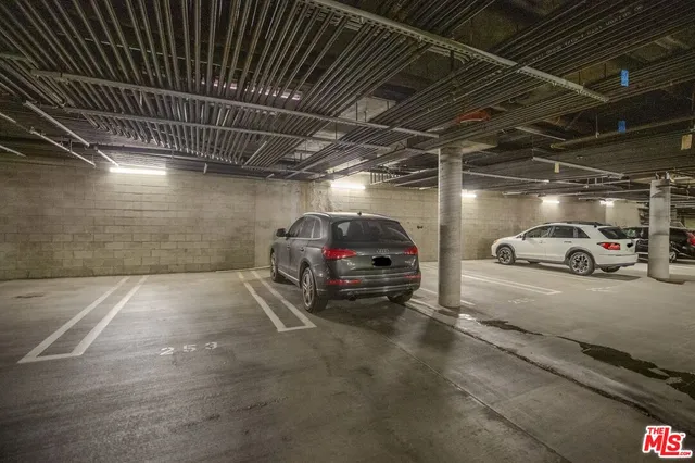 a view of a city with tall buildings and more windows
