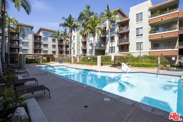 a view of an buildings with swimming pool