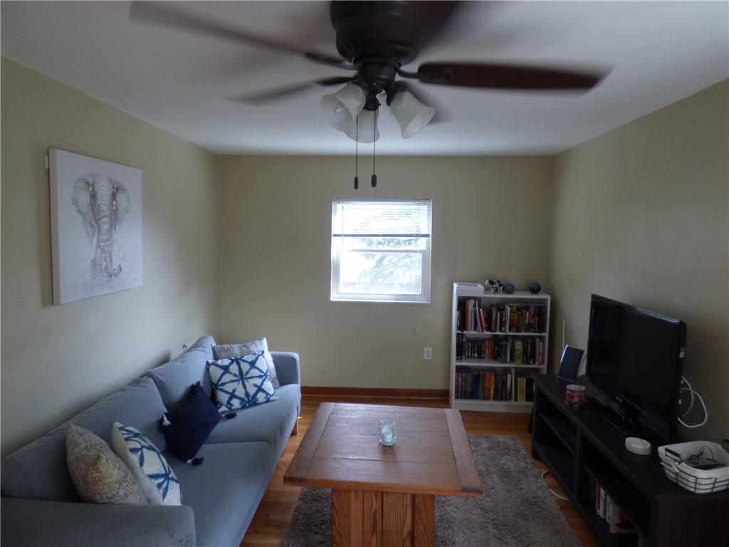 41 Charlton Street, Unit 2 Pittsburgh, PA 15204 - Photo 12 of 17 a living room with furniture and a flat screen tv