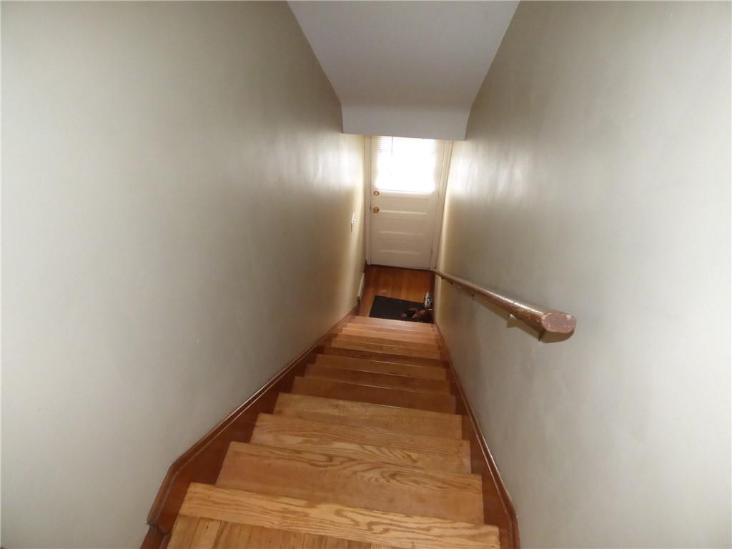 41 Charlton Street, Unit 2 Pittsburgh, PA 15204 - Photo 15 of 17 a view of a hallway with wooden floor and staircase