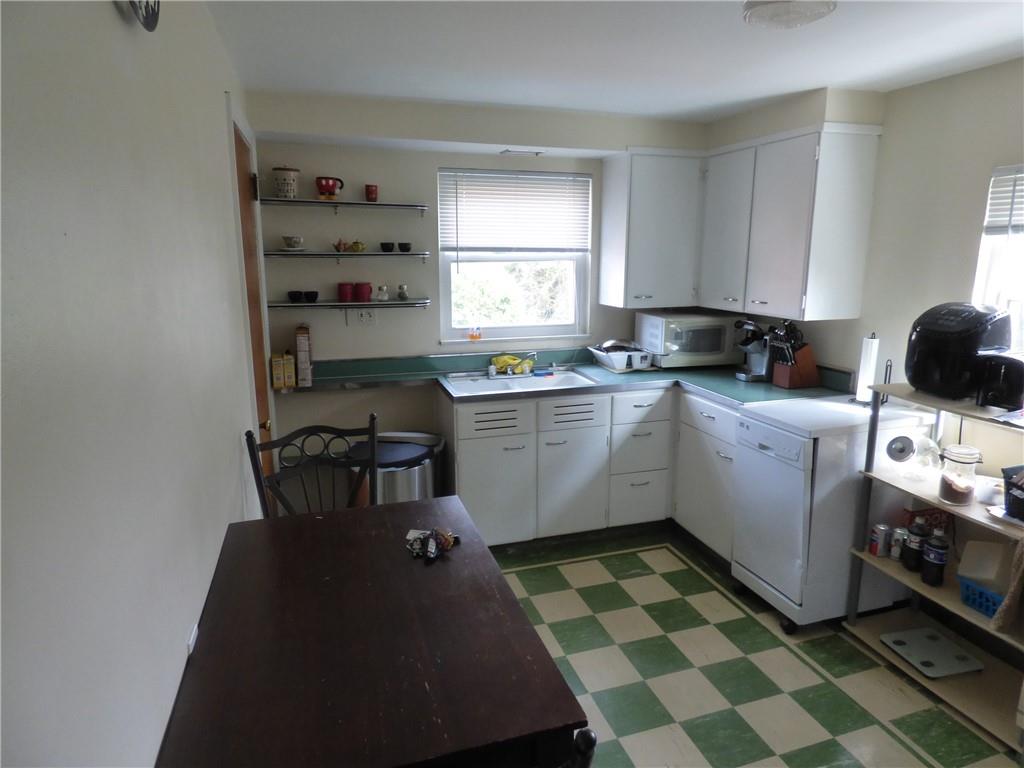 41 Charlton Street, Unit 2 Pittsburgh, PA 15204 - Photo 5 of 17 a kitchen with a sink a stove a window and cabinets