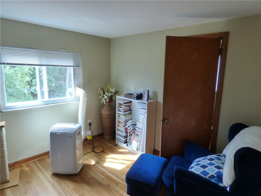 41 Charlton Street, Unit 2 Pittsburgh, PA 15204 - Photo 10 of 17 a living room with furniture and a window