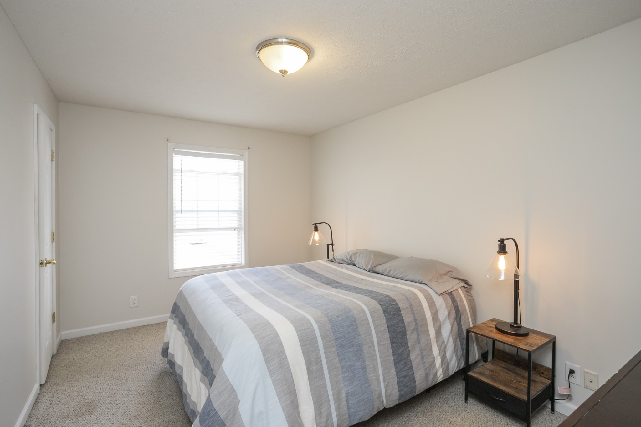 3354 Lipscomb Cemetery Road Springfield, TN 37172 - Photo 25 of 46 a bedroom with a bed and a window