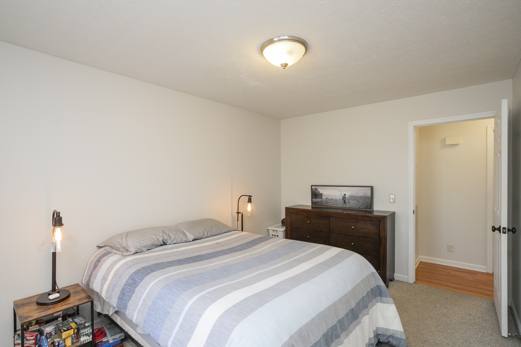 3354 Lipscomb Cemetery Road Springfield, TN 37172 - Photo 26 of 46 a bedroom with a bed and a lamp