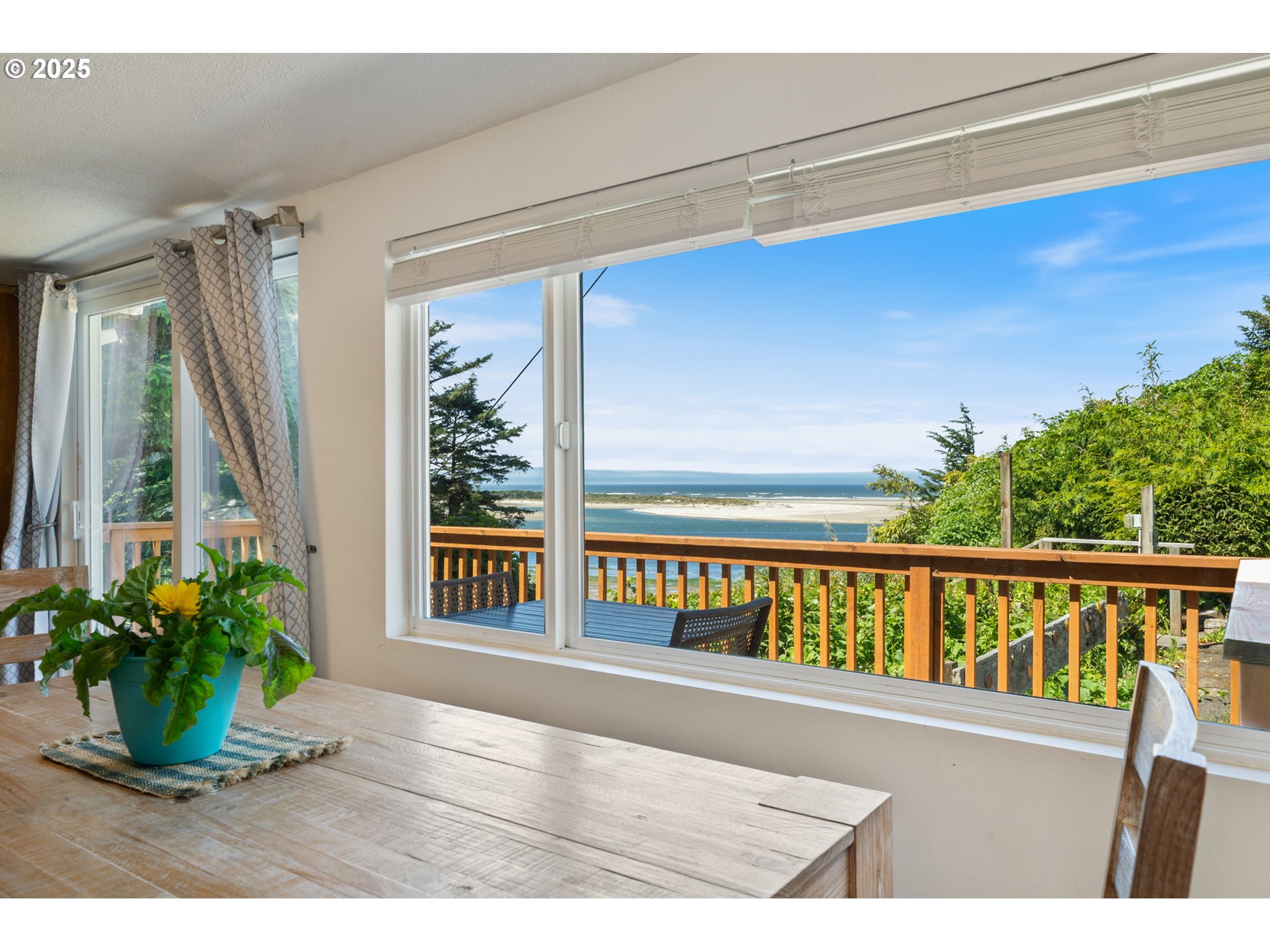 1195 3rd Street Netarts, OR 97141 - Photo 2 of 35 a view of an entryway with wooden floor
