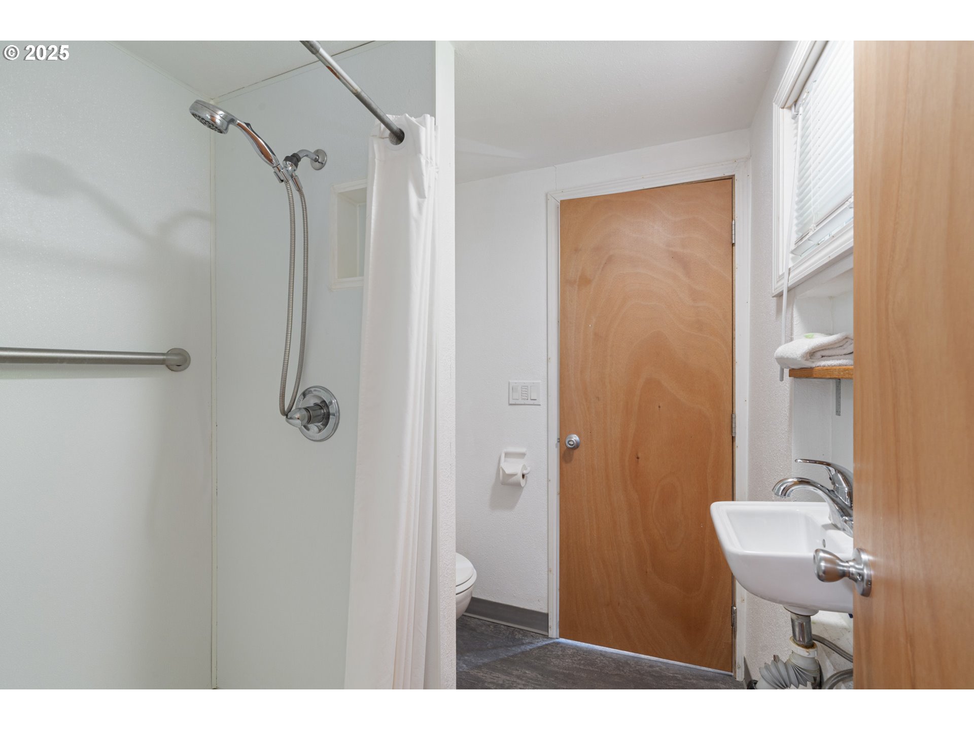 1195 3rd Street Netarts, OR 97141 - Photo 23 of 35 a bathroom with a shower