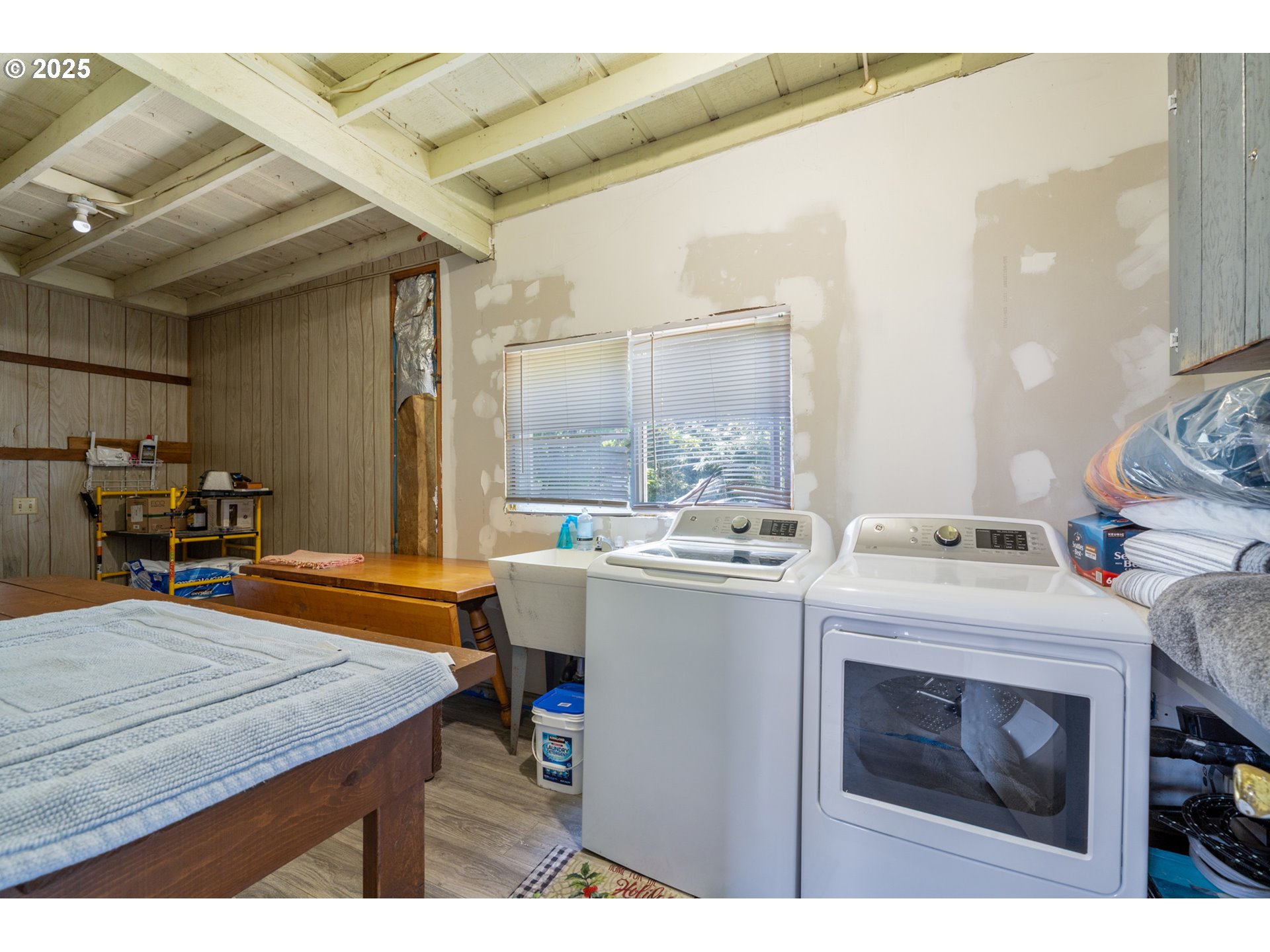 1195 3rd Street Netarts, OR 97141 - Photo 27 of 35 a room with storage and utility