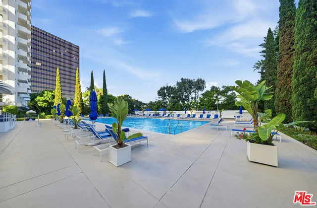 a view of a park with sitting area