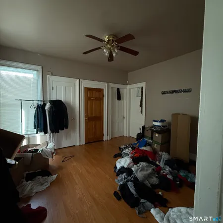 a room with gym equipment and a mirror