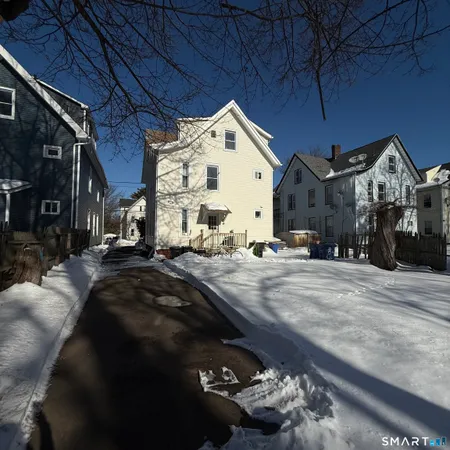 a view of a street with cars
