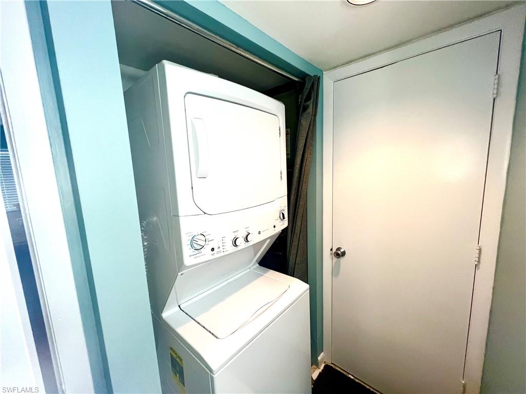 2207 San Marco Road, Unit 4104 Marco Island, FL 34145 - Photo 15 of 21 a utility room with dryer and washer