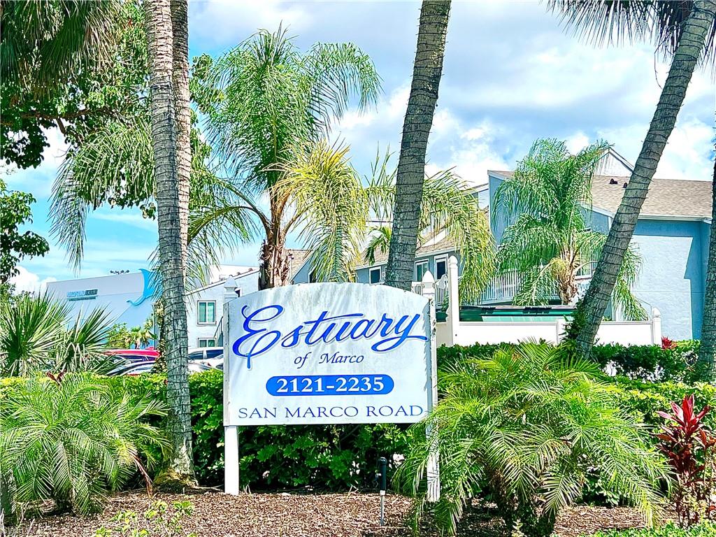 2207 San Marco Road, Unit 4104 Marco Island, FL 34145 - Photo 2 of 21 a sign on the side of a building