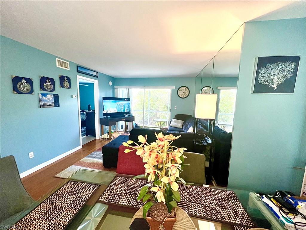 2207 San Marco Road, Unit 4104 Marco Island, FL 34145 - Photo 4 of 21 a bed room with a bed and a window