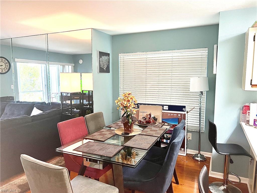 2207 San Marco Road, Unit 4104 Marco Island, FL 34145 - Photo 6 of 21 a view of a dining room with furniture window and outside view