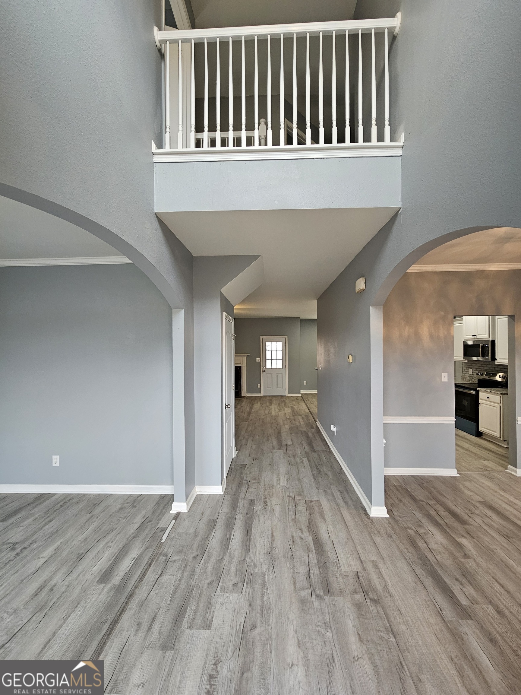 248 Sky Hawk Lane Macon, GA 31216 - Photo 4 of 6 a view of a hallway with wooden floor