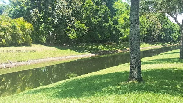 a view of a yard with an outdoor space