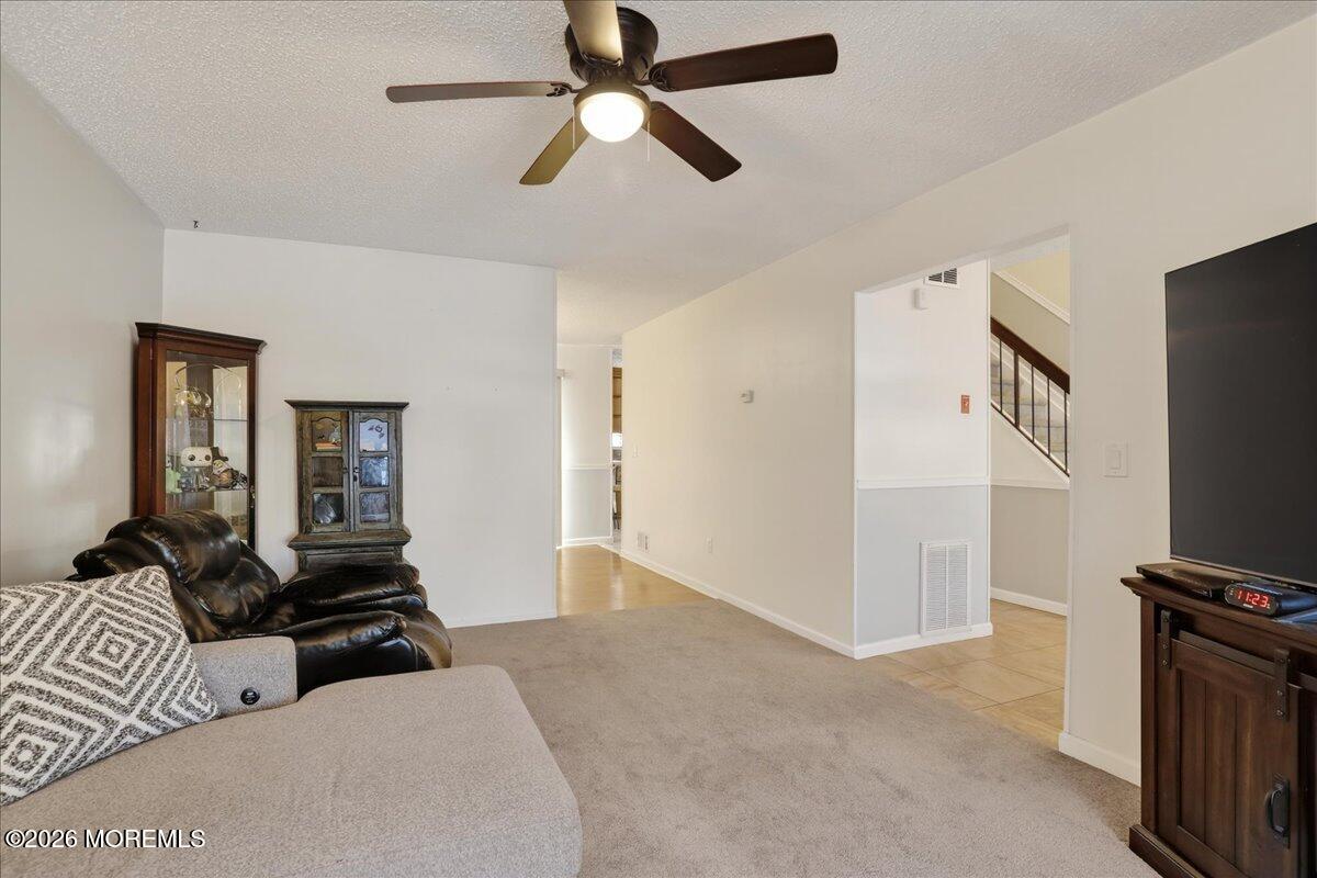 95 Azalea Circle Jackson, NJ 08527 - Photo 26 of 62 a bedroom with furniture and a flat screen tv