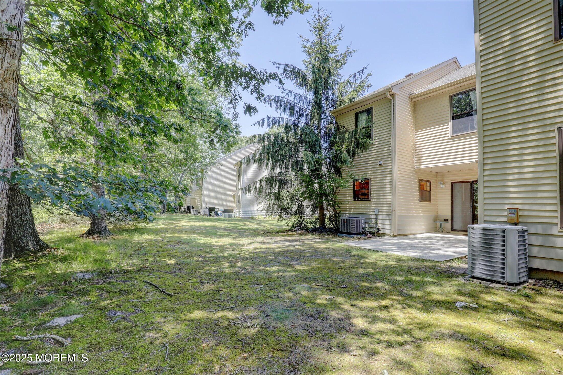 95 Azalea Circle Jackson, NJ 08527 - Photo 42 of 62 a view of a house with a yard and tree s