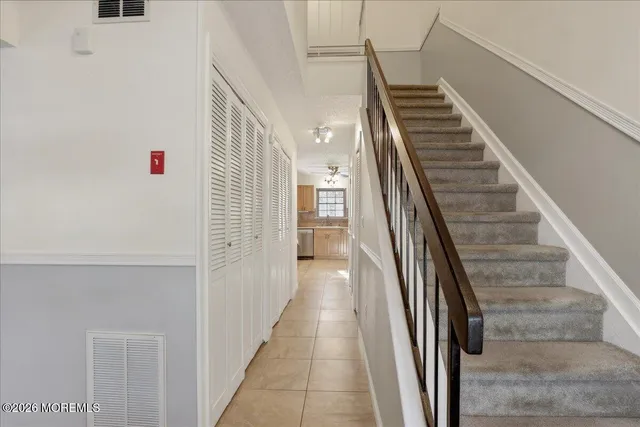 a view of a hallway with a furniture