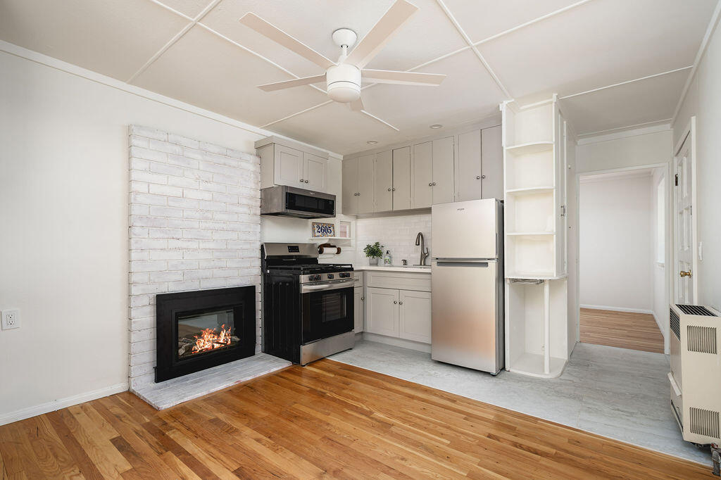 2605 Bath Street Santa Barbara, CA 93105 - Photo 13 of 20 a kitchen with a refrigerator stove and a sink