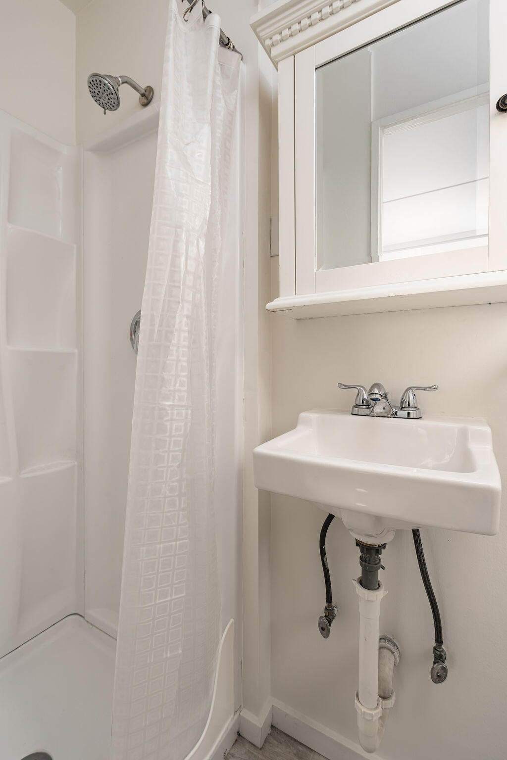 2605 Bath Street Santa Barbara, CA 93105 - Photo 18 of 20 a bathroom with a sink and mirror