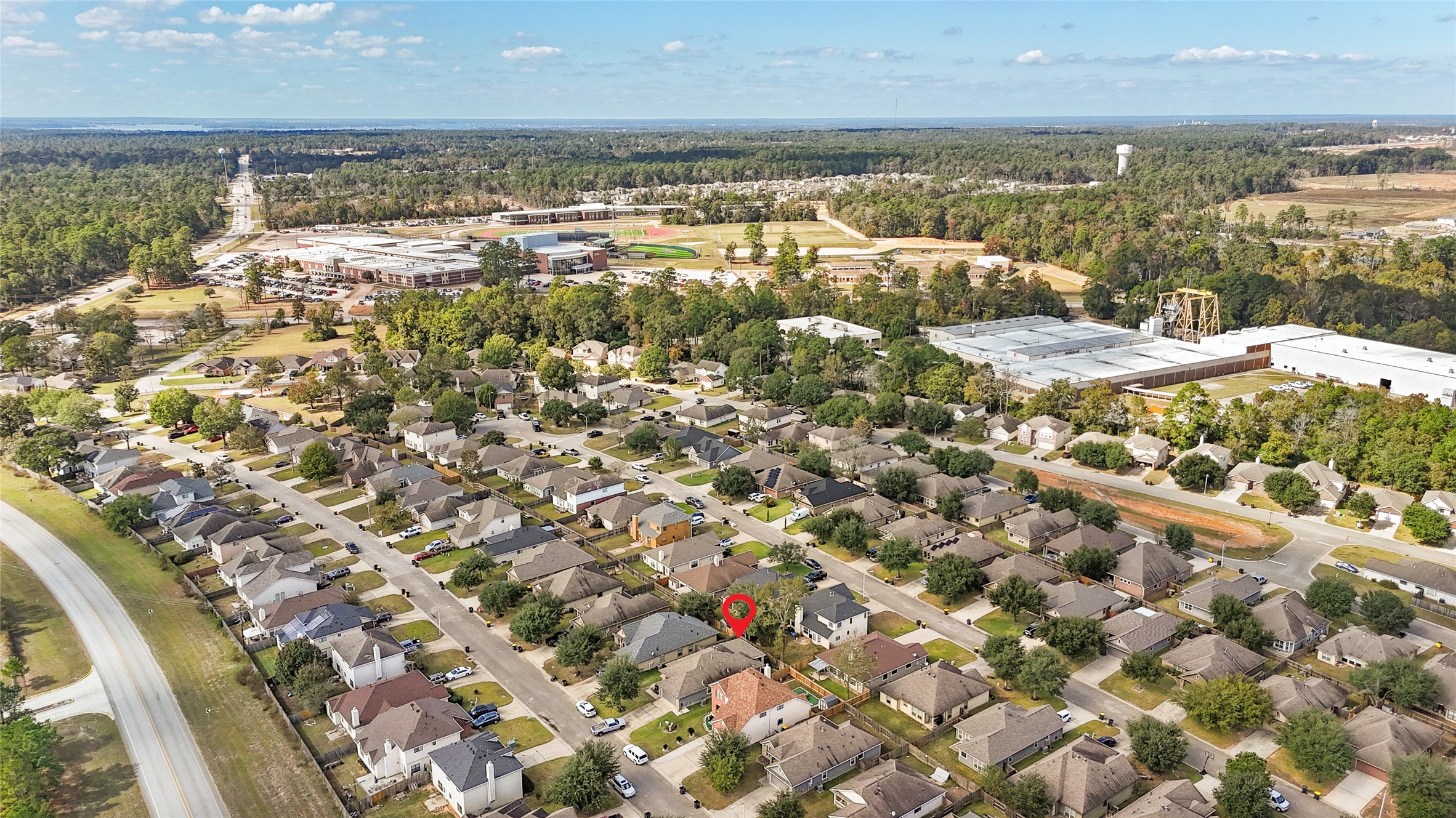 962 Oak Falls Drive Conroe, TX 77378 - Photo 28 of 28 a view of city and ocean