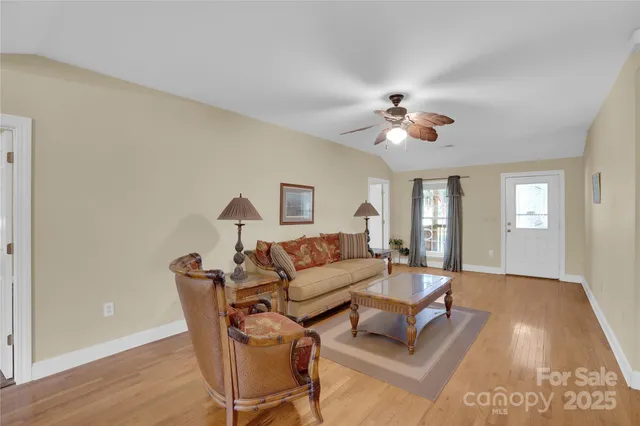 a view of livingroom with furniture and wooden floor