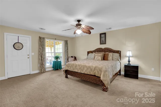 a bathroom with a sink a mirror and shower