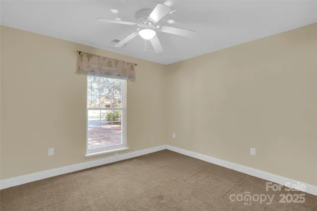 a view of a hallway with windows