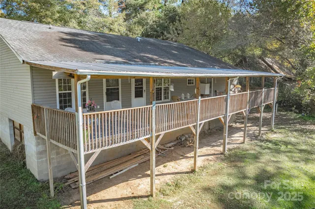 a big yard with large trees