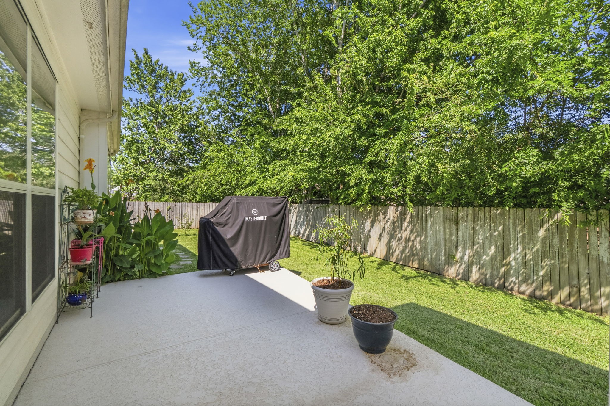 10802 Windswept Montgomery, TX 77356 - Photo 41 of 42 a view of a garden with plants and a bench