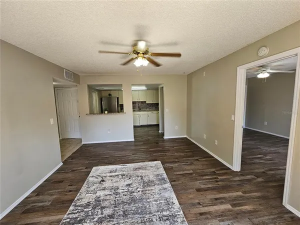 a view of a swimming pool with a yard