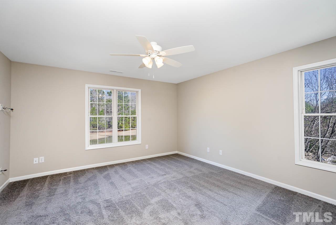 8409 Neuse Timbers Court Raleigh, NC 27616 - Photo 17 of 30 Second Floor Primary Bedroom w/custom new carpets, ceiling fan, ensuite, walk in Closet..waterview