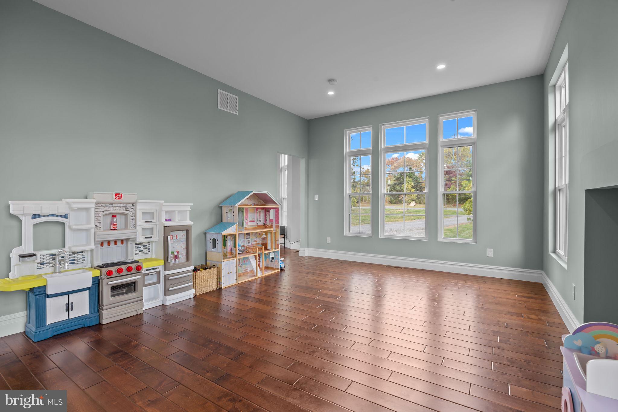 274 Pineville Road Newtown, PA 18940 - Photo 14 of 109 a living room with furniture and a wooden floor