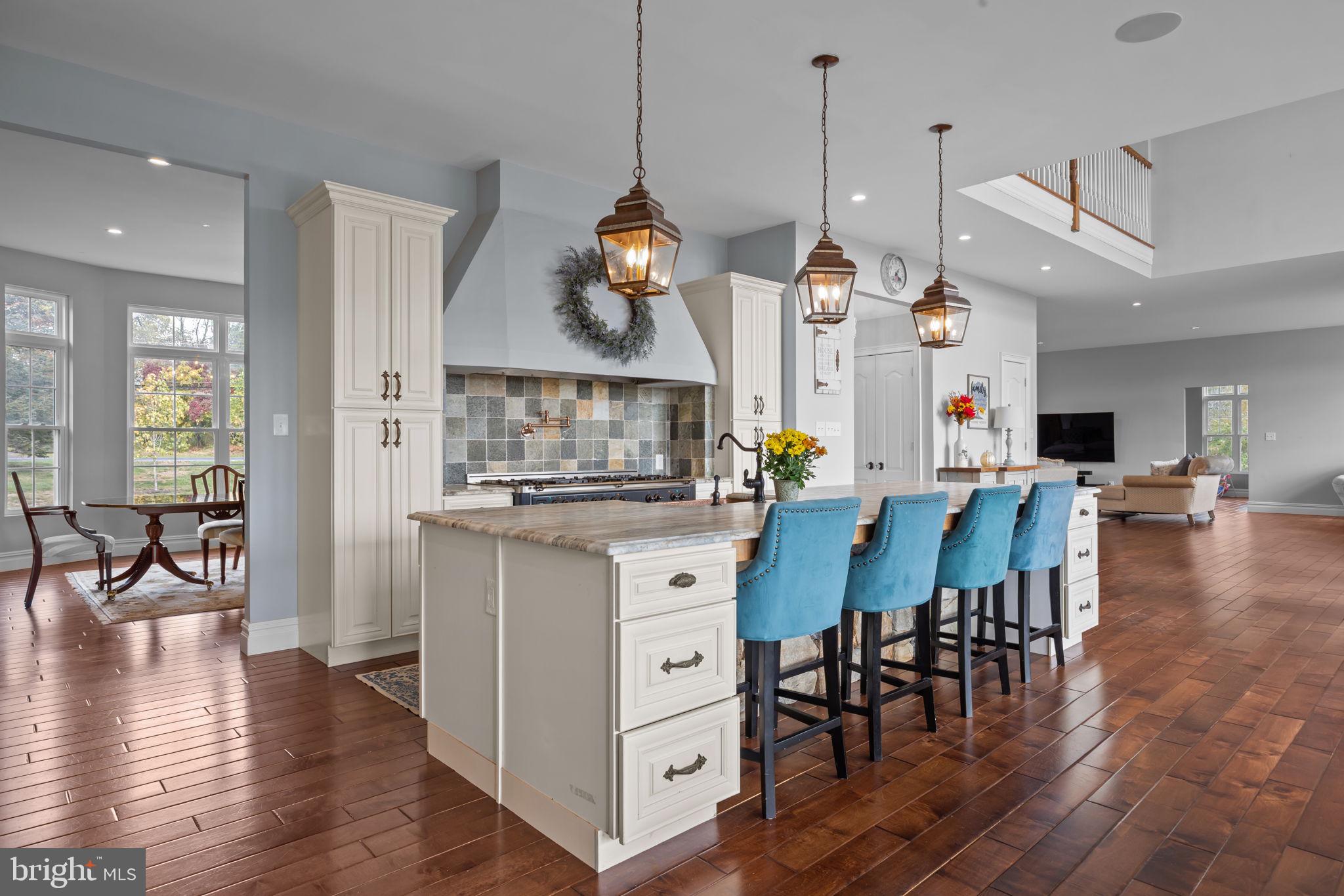 274 Pineville Road Newtown, PA 18940 - Photo 25 of 108 a large kitchen with a table and chairs